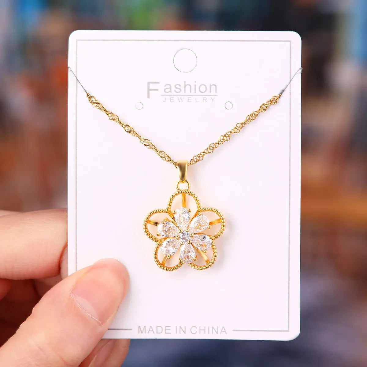 X5838# Rotating White Zirconium Five Petal Flower