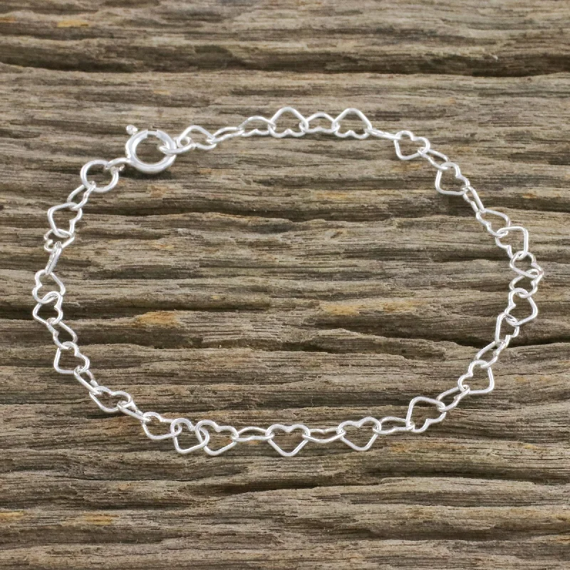 Affordable women's bracelets -Lots of Love Heart Motif Sterling Silver Link Bracelet from Thailand