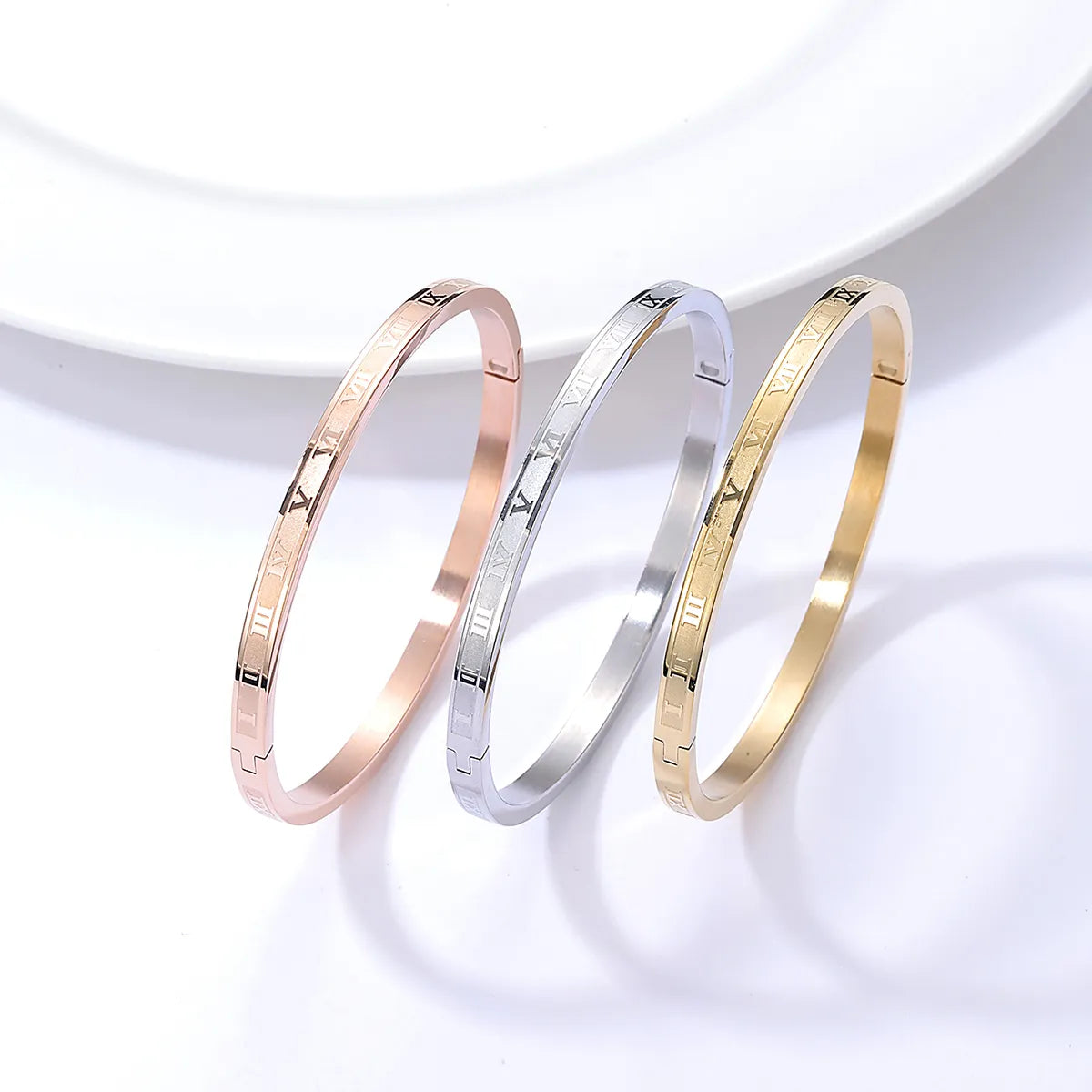 Women’s bracelet stack -New Fashion Stainless Steel Electroplated 18k Three-color Roman Number Bracelet Set